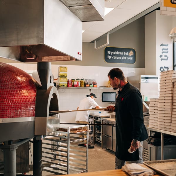 Finishing a pizza with parm blend